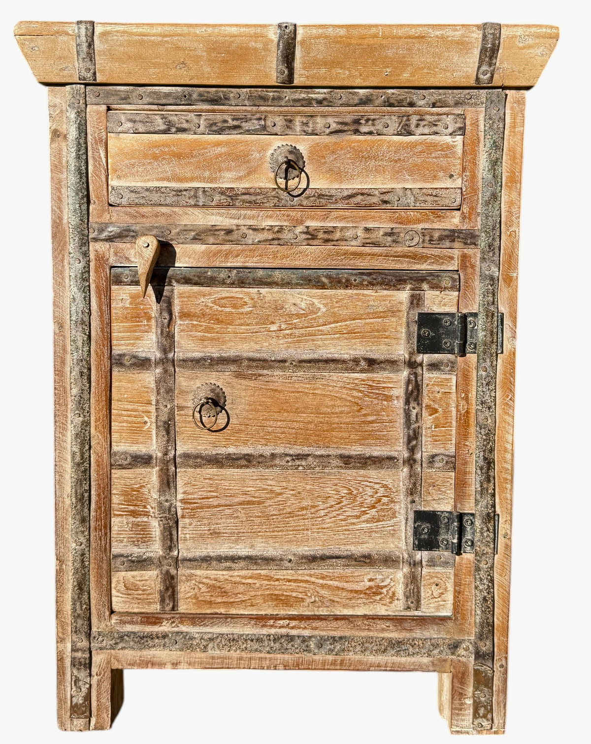 Wooden cabinet with two doors and a drawer on a white background