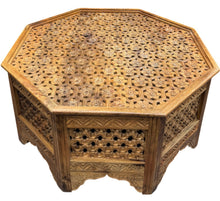 Carved coffee table
