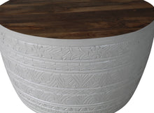 Carved round coffee table