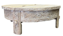 Round coffee table with storage