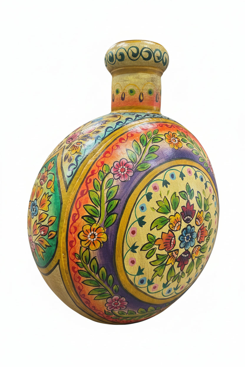 A round hand-painted ceramic bottle with a narrow neck, decorated with intricate floral and geometric patterns in yellow, purple, green, orange, and pink on a checkered gray background.