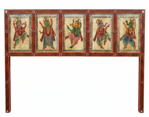 A traditional Indian hand-painted wooden bed frame (chola) with four colorful deity panels, displayed against a white wall in what appears to be a furniture showroom.