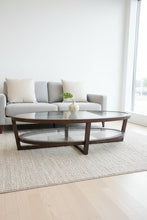 Oval glass coffee table